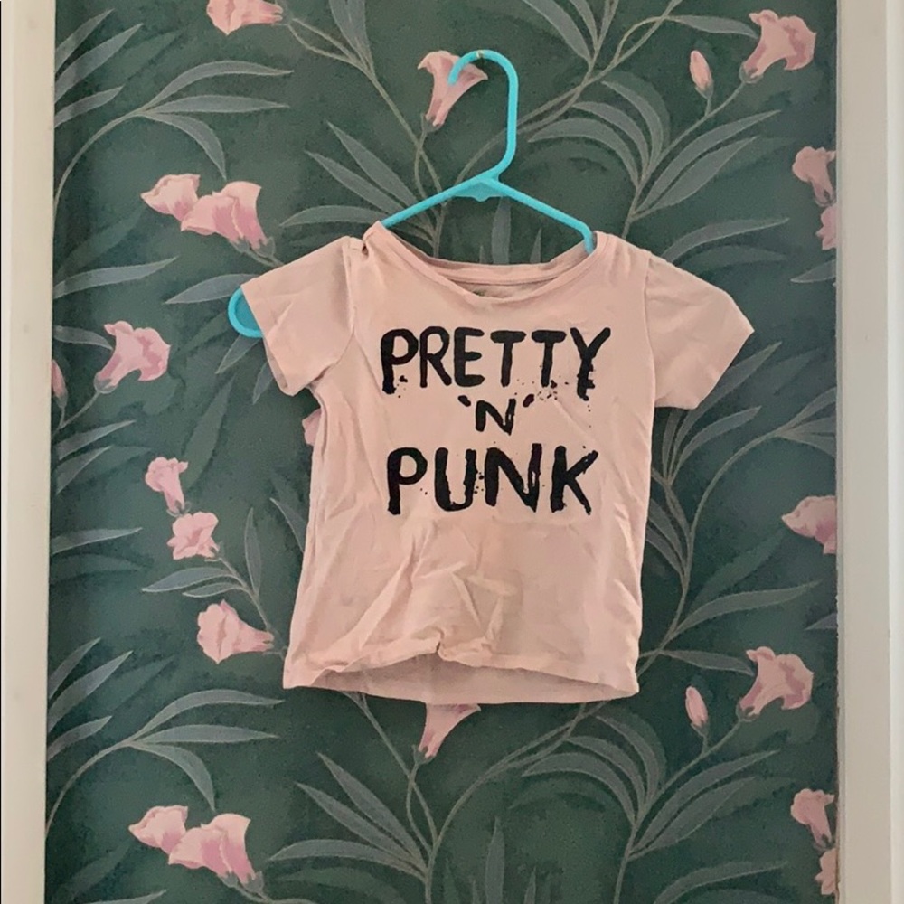 A pink and black Dip kids shirt
